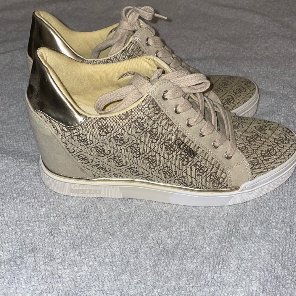TWO pair of Guess wedge sneakers. Used once.
